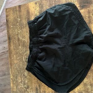 Black Nike running shorts